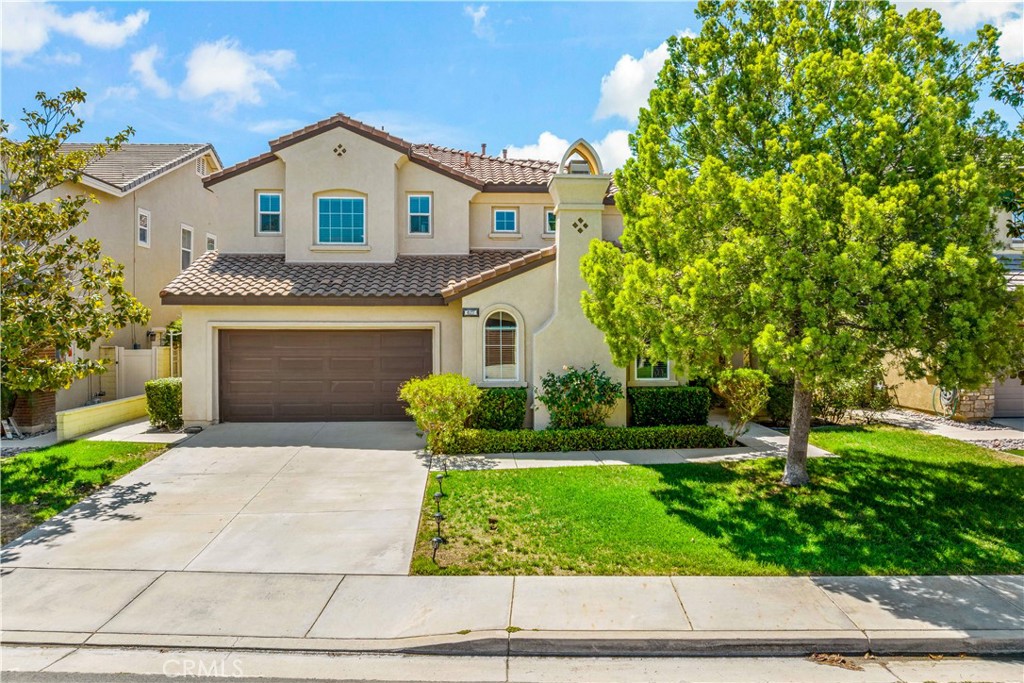 Your DREAM home awaits... located in the prestigious Alberhill Ranch community. This 5-bedroom, 3-bathroom home offers impressive curb appeal and a thoughtfully designed open-concept floor plan that exudes modern sophistication and comfort.
From the moment you enter, you are greeted by a dedicated formal living room with a cozy fireplace. The home has a perfect blend of premium tile and lush carpet throughout. The gourmet kitchen is a true showpiece, featuring quartz waterfall countertops, a stunning backsplash, and high-end finishes that blend style and functionality.
A versatile bonus room near the kitchen offers endless possibilities—as a stylish home office, entertainment lounge, or game room. Boasting a main floor bedroom and full size bath; perfect for guests or in-laws.
Step outside into your private backyard oasis, vinyl fencing, seating areas, and mature fruit trees create the perfect atmosphere for outdoor living and entertaining.
Enjoy resort-style amenities including a community clubhouse, pools, and a water park, all just a short walk away. With close proximity to great schools, shopping, dining, parks, and major freeways, this extraordinary home offers the perfect blend of convenience and elevated living.
A rare opportunity to own one of Alberhill Ranch’s finest homes—schedule your private tour today.
