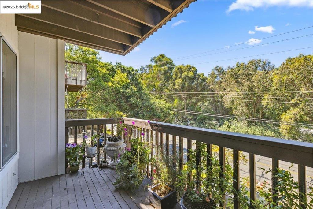 Come, immerse yourself in the wooded seclusion of this Lovely & Coveted end unit townhome. Located conveniently in the Oakland Hills, just above the 580 & the 13, you'll find it an easy commute around the Bay. Minutes away, many amenities abound in Montclair Village, Lake Merritt (Grand/Lakeshore)...even in San Leandro or Berkeley! Inside the privacy of your sanctuary, you'll find more than what's ever expected. Spacious by any means at 878 sq ft of COMFORT, this economical, split-level abode is stunning. Freshly painted, New Carpet, Beautifully Remodeled kitchen & Bath. Create culinary masterpieces or just make a morning espresso amidst your Stone countertops, Customized Cabinets, Stainless steel appliances, & then, enjoy the lovely, wooded view as you wash the dinner dishes. Dual pane windows & sliders throughout allow not only a feeling of being one with nature but help to keep the home cozy in winter and cooler in the warmth of summer. Romantically, the primary bedroom slider opens to the serene back patio for a gentle start to your day, with latte in hand. Later it's a great place to have a quiet dinner or throw a weekend Summer BBQ or tea party!7400 Mountain 2A:First time on market in 15 years will now affordably go to "YOU" the lucky new owner. Get on the list to see ASAP!