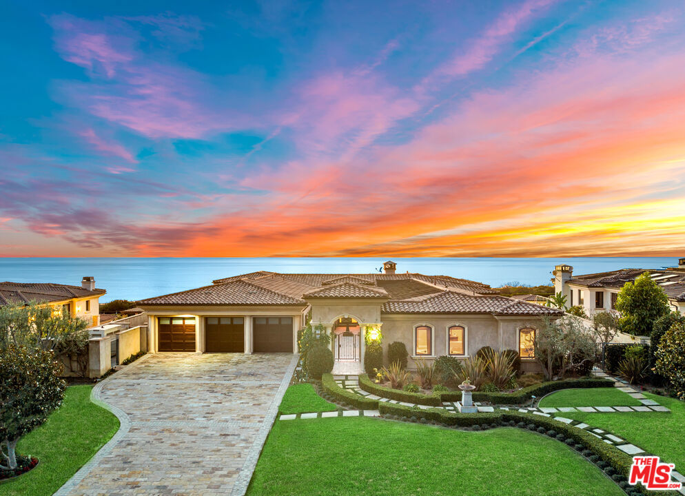 Stunning sprawling Mediterranean estate set on an exclusive enclave with commanding views of the ocean and beyond. This custom-built home features 5 bedrooms all with private baths plus an additional 2.5 baths. A Large living room with hardwood floors; family room on main level with built in entertainment system, custom bar w/ built in subzero wine fridge; kitchen w/ double Wolf ovens, granite counter tops, walnut cabinets, and large custom walk-in pantry; and large formal Dining Room. On the main level is an oversized Master suite with fireplace a sitting area, private balcony, and spa like bath. With ocean views from every angle, and built to incorporate indoor/outdoor living with pool & spa in an enclosed atrium with accordion doors that open to the massive back yard w/ TV and access to shower & change room and large outdoor BBQ . Other features include courtyard entry with a fountain, 5-car garage w/ epoxy floors; Crestron surround audio and security systems; gym room; two side by side private office with direct access to a private courtyard, perfect for anyone who works from home; lots of cabinets throughout; balconies with panoramic views, and copper gutters on the exterior. A Superb custom-built home by Simich Construction. Set on a 31,918 SF lot the private grounds are meticulously manicured. Enjoy the park like setting the private back yard offers with unobstructed views of the ocean from every angle.