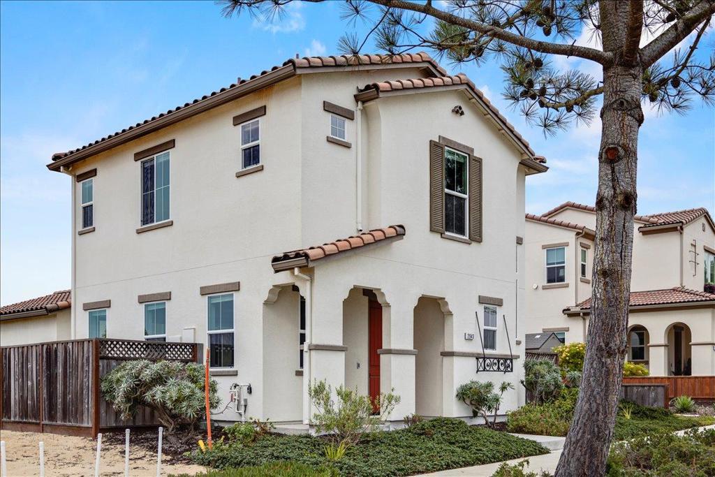 This newer-construction home in the highly sought-after SeaHaven community offers the perfect blend of comfort, style and community living. With 3 beds, 2.5 baths, 1,523 sq. ft., this Spanish-inspired residence is located in one of Marina's most prestigious neighborhoods. Step inside to a bright and open living area featuring tall ceilings, spacious kitchen w/ granite counters, stainless steel appliances, & classic wood cabinetry - perfect for everyday living & entertaining. A convenient downstairs laundry room (washer and dryer included), half bath, & attached 2-car garage w/ a 220 outlet for EV charging add modern convenience, while the rare private driveway offers extra parking. Upstairs, you'll find 2 generously sized bedrooms connected by a Jack-and-Jill bathroom, along w/ a spacious primary suite. The primary retreat boasts a unique entryway, walk-in closet, dual sinks, walk-in shower, & a private toilet room for added comfort. Designed w/ energy efficiency in mind, this home also showcases a durable tile roof & timeless stuco exterior. Both yards have been landscaped with a modern flair & drought resistance in mind. Beyond your front door, the SeaHaven community offers a welcoming clubhouse where neighbors come together for holiday events, yoga classes & more!