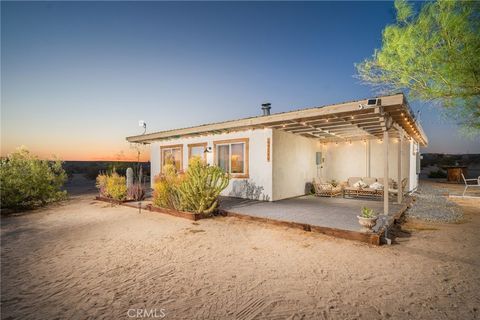 Photo of 69126 Rainier RD, 29 Palms, CA 92277 (MLS # OC26106665)