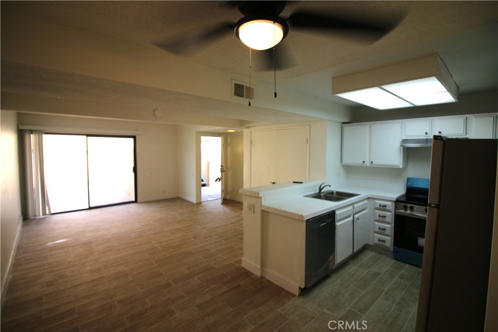 Remodeled unit new tile flooring, new paint, new bathroom vanity, new blinds, new stove, dishwasher, hood vent and refrigerator, Super clean condo in move in ready condition. Very close to the college