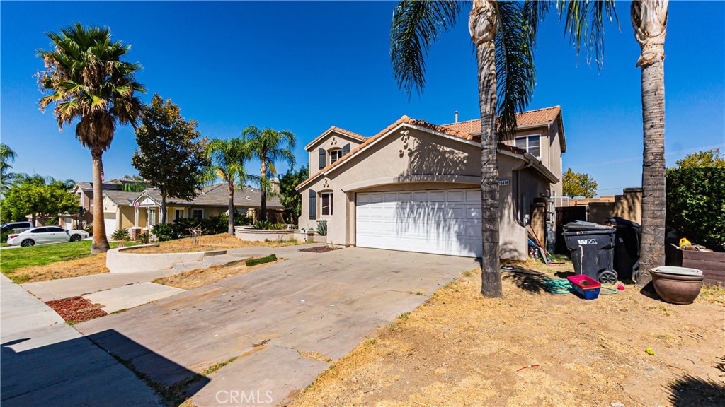Welcome to this spacious 4 bedroom, 3 bathroom home offering 2,525 sq ft of living space in a desirable Menifee neighborhood. Built in 2005, this two-story residence features a bright and open floor plan with a large living area, comfortable dining space, and a kitchen with plenty of cabinet and counter space. The home sits on a 7,400 sq ft lot with a private backyard, perfect for outdoor gatherings. Upstairs, the generous primary suite includes a walk-in closet and ensuite bath with dual sinks, soaking tub, and separate shower. Additional bedrooms are well-sized and versatile for family, guests, or office use. The property includes a convenient downstairs bedroom and full bath, laundry room, and attached garage. Located close to schools, parks, shopping, and freeway access, this home combines comfort and convenience in a growing community. With its size, layout, and location, this home presents excellent potential for customization and long-term enjoyment.