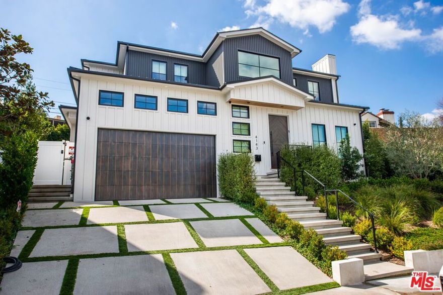 Experience the epitome of modern luxury living at 4143 Davana Road. A striking curb appeal welcomes you to this elegant residence, featuring meticulous landscaping, a manicured lawn, and a grand entrance that sets the tone for the luxury within. Step inside to discover expansive living spaces characterized by an abundance of natural light, soaring ceilings, and impeccable attention to detail. The open floor plan seamlessly connects the main living areas, creating an inviting ambiance ideal for both relaxation and entertaining. The gourmet kitchen is a chef's dream come true. Equipped with high-end stainless steel appliances, custom cabinetry, and a spacious center island with seating, it offers the perfect space for culinary creativity and casual dining alike. Featuring a spacious layout, a walk-in closet, and a spa-like ensuite bathroom complete with dual vanities, a soaking tub, and a separate shower. Additional bedrooms offer comfort and privacy for family members or guests. Experience the ultimate entertainer's paradise with a pool featuring a relaxing waterfall, a soothing spa, and ample space for alfresco dining, lounging, and hosting unforgettable gatherings. Experience the pinnacle of technology with cutting-edge Smart Home features, elevating comfort, efficiency, and peace of mind to unprecedented levels.