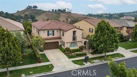 Meticulously well-mainted residence in a tranquil upscale setting in Pine Valley Estates, located right next to Western Hills Golf Course.This residence has 180' unobstructed VIEWS of the golf course, hills and mountains with no neighbor behind.The amazing views can be seen from both the main level and second level of the home, and every bedroom has a View!!.The property has many upgrades porcelain and ceramic tiles, Barber carpet throughout.Crown moulding plantation shutters. New paint in and out ,also an electric vehicle charging in garage, an intercom in every room. There is a main floor guest suite and 2 car side by side garage. The built in BBQ grill in the generous sized backyard . Central vacuum , of course there is !! . This residence is within the boundaries of prestigious Chino Hills and conveniently located near The Shoppers at Chino Hills, Chino Spectrum, markets and near the 71, 60, 91 Freeways. Grate school school district. Don't miss out on this wonderful opportunity on a move -in ready view home in Chino Hills.
