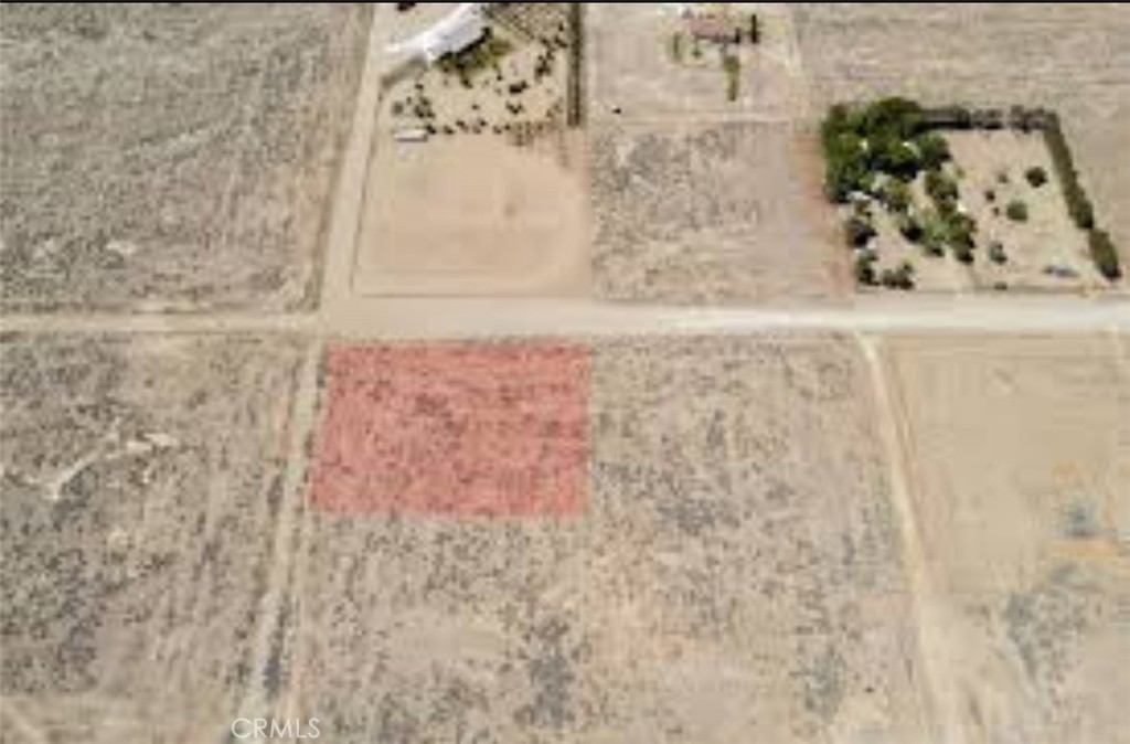 Don't miss your chance to own this spacious 2.47 acre lot nestled in the peaceful desert landscape of Rosamond. Offering privacy and serenity, this parcel provides the perfect canvas for your dream home (Buyer to Verify), desert retreat, or investment for the future! Enjoy wide-open skies, beautiful sunsets, and the freedom of rural! This property is ideal for those seeking space, peace, and potential! Buyer to verify all zoning, usage, and utility availability with Kern County!
