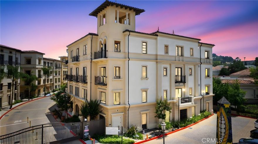 Avanti!  The premiere address in Calabasas.  Luxurious single story living in an upscale gated community in the heart of Calabasas.  Close to everything that Calabasas has to offer, including the Commons, Courtyard at the Commons, Trader Joes, the weekend farmers market, Calabasas Lake, Calabasas Swim and Tennis club and more.  This complex has the unusual and secure resident only lobby with private elevator entrance leading to your own foyer.  This home boasts custom light fixtures, wide plank wood flooring, neutral berber in the bedrooms, a primary bath right out of a spa, 10 foot ceilings, French doors and wide open sliders to the oversized patio, tree top and city light views, custom drapes, custom wall paper, gorgeous added custom built-in cabinetry in the primary, shaker white cabinets and an oversized island in the kitchen as well as a breakfast bar, Subzero fridge, amazing five burner cooks oven, high baseboards, LED lighting, built out master closet, and so much more.  The large inside laundry room has loads of storage as well as a sink and pantry.  There are two dedicated parking spots for this unit with built in extra storage space. The two spaces are extremely close to the elevator.  No stairs!  This spacious and open floor plan is so flexible and built for easy living. Think you need three bedrooms?  Come check this unit out.  The two bedrooms are super spacious!  Secondary bedroom could be an office and guest room, Murphy bed anyone?  The primary is enormous with addded beautiful built ins with shelves, closet space and two built in desks.  The large, divided light windows with beautiful wood trim add an enormous amount of light to the unit, whatever time of day, but even with all those windows the privacy is amazing. Las Virgenes Schools add to the value of this property, as well as access to Calabasas Park, and Calabasas Lake! This home feels like the Four Seasons every day.  Like to travel?  This is the perfect Pied a Terre!  Lock it and go, and come home to elegance.  There's nothing else like Avanti.  Don't miss this lovely and upgraded unit.