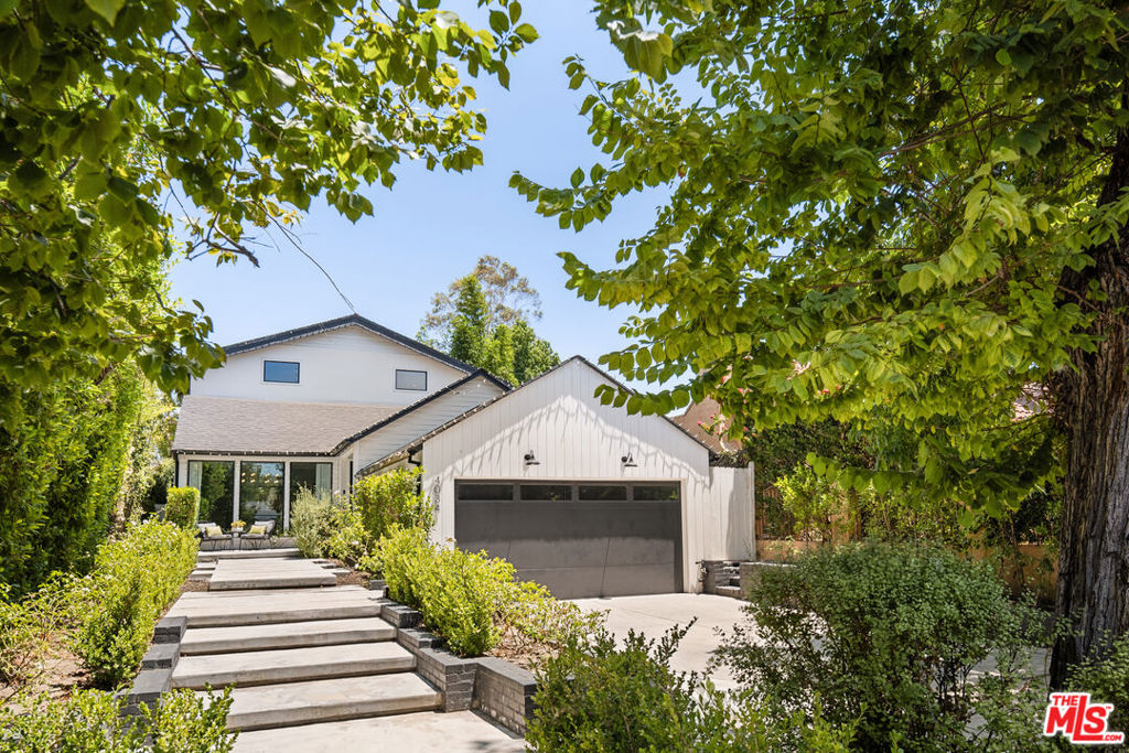 What a great house. Super clean, totally on-trend design with cool fixtures, tiles and custom cabinetry, this 3 bedroom house is set deep off the street on a quiet dead-end street close to a huge park. What an absolutely perfect location - quickly get to all of Studio City's hip restaurants and shopping, as well as the trendiest clubs in Hollywood and downtown LA. The open floor plan kitchen is ideal for hosting sophisticated parties. Everyone will gather in the kitchen and then migrate to the lovely dining room. The soaring high ceiling and expansive disappearing wall of glass that opens to the private backyard continues the setting for that chill vibe. Generous wall space offers an excellent opportunity for impressive personal creative decorating or art collection. The white oak floors create a warm, modern aesthetic. It's a very sexy primary suite with gorgeous bathroom. You'll love the ample natural light. The bathroom suite feels better than a penthouse suite. The entire package rocks a large walk-in closet, soaking tub, glass-enclosed shower, double vanity, beautiful custom cabinetry, and oversized skylights.The main level rooms set up well for home office, creative space, gym, or even roommates. This is a superb and smart investment for a single-family home lifestyle rather than any nearby condos.