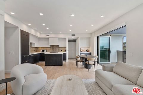 Photo of 505 S Barrington Avenue #401, Los Angeles, CA 90049 (MLS # 26663157)