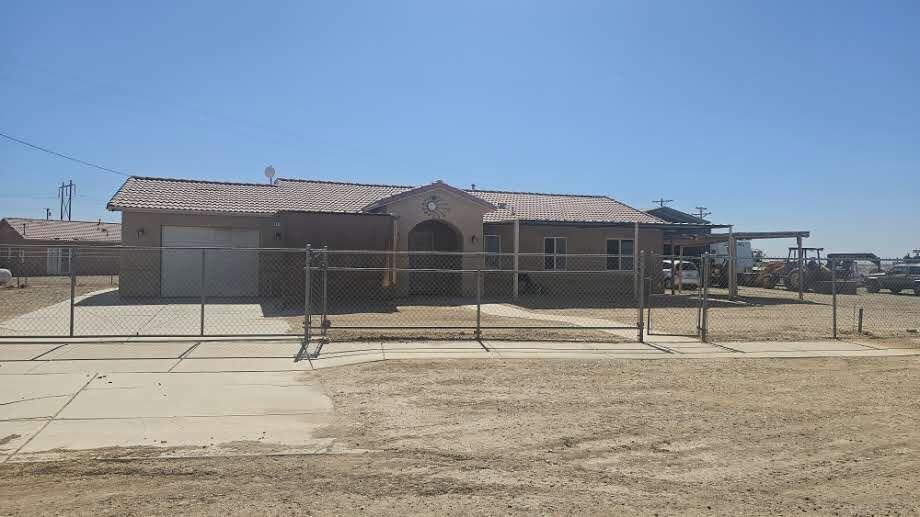 Discover this versatile 3 bed, 2 bath home in Thermal, CA, offering 1,300 sq ft of comfortable living. Featuring tile floors in the kitchen and baths, laminated wood in the living room and bedrooms, and stylish tile countertops. Enjoy two covered patios--front and back--that provide shade and help keep the home cool during hot summer days. A detached metal building offers space for two additional vehicles, ideal for off-roaders, truckers, or anyone who enjoys working on cars. The property also includes the option to purchase the neighboring lot, which features another metal building on a concrete foundation. Together, both lots total over half an acre--plenty of room to build, store, or expand. With space, functionality, and opportunity, this home is ready to be yours!