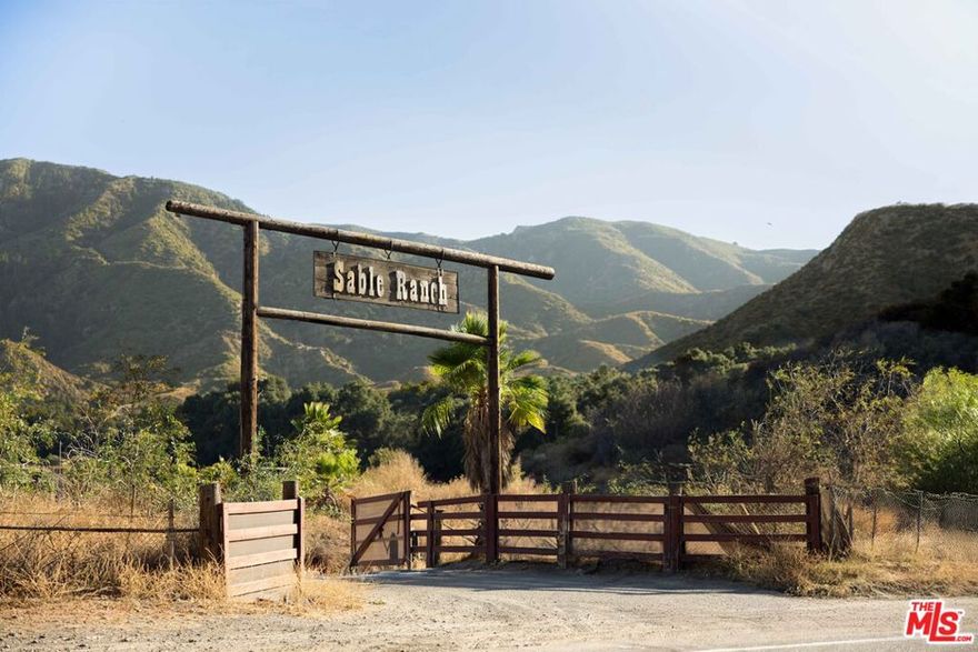 Nestled in the picturesque Santa Clarita Valley, Los Angeles County, Sable Ranch spans nearly 400 acres of diverse terrain, from rolling meadows and oak-studded hills to rugged mountains. Originally a rural homestead integral to California's agricultural and ranching history, it has evolved into a distinguished movie studio location. Sable Ranch has captivated filmmakers with its versatile landscapes, easily transforming into Old West towns, farmlands, or rugged wilderness. Its reputation as a top filming destination was cemented by iconic productions such as "Criminal Minds", "24," "Firefly," and "Robin Hood: Men in Tights". The ranch benefits from its inclusion in the Movie Ranch Overlay Zone, which simplifies permitting and setup, making it ideal for seamless film productions. With modern utilities including underground electricity, natural gas, and is well-equipped for large-scale projects.There are multiple parking facilities with capacity for hundreds of vehicles, accommodating projects of any scale, as well as two on-site helicopter pads. In addition to its current use as a film hub, Sable Ranch presents opportunities for future development. Zoned for agriculture, filming, recreation, and potential residential or commercial subdivision, it offers a unique blend of natural beauty, entertainment history, and growth potential. For studios, investors, or developers, Sable Ranch is a premier acquisition, combining rich California heritage with exceptional filming and development prospects.