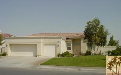 Spacious, 4 large bedrooms with good closet space, Bonus: 3 car garage. Corner Lot. Centrally located off Adams St in La Quinta just south of Miles. Walk to La Quinta High School, and the park. Lower utility district I.I.D. Large living room with dining plus family room with fireplace open to the kitchen. Tile floors carpet in bedrooms & living room. Private walled in back yard, with patio. Clean and well maintained home. No pool, No HOA