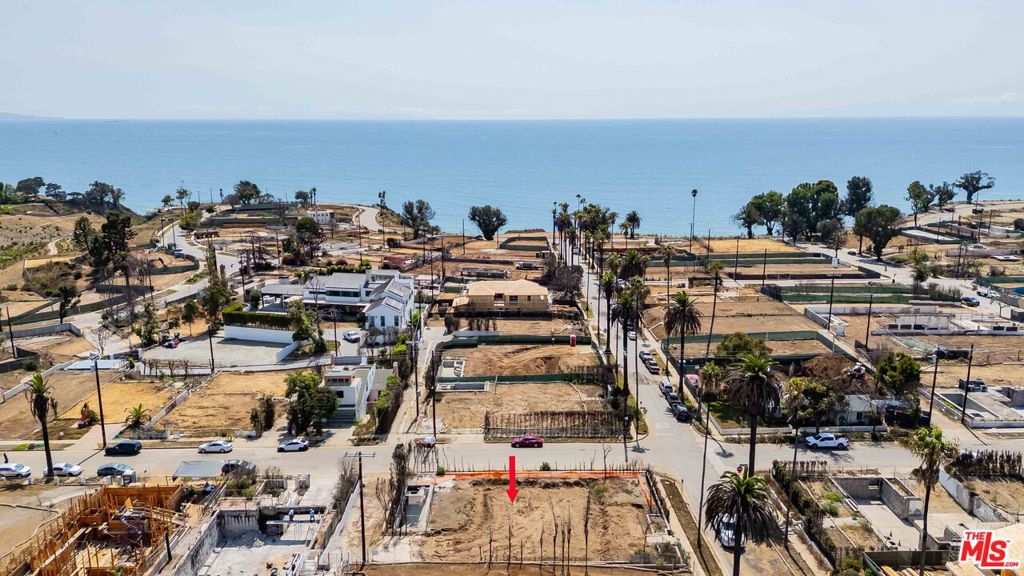 500 Swarthmore Avenue is the lot you have been waiting for: a prime location, an elevated corner lot, and a generous size. This oversized 8,330 sq ft parcel sits just a few blocks from the heart of Palisades Village in the highly desirable Via Bluffs. Located only a few lots from the bluffs, where sunsets are spectacular, the property includes a unique driveway in the rear, allowing for a wide variety of home designs. The previous Cape Cod-style home, custom-built in 2017, offered ocean views from the second floor and was a jewel of the neighborhood. This is the perfect opportunity to build your dream home close to Palisades Village, schools, parks, hiking trails, and the beach. Set on one of the most coveted streets in the neighborhood, Swarthmore combines small-town charm with vibrant coastal living. Whether you envision a sleek contemporary retreat or a timeless estate, this expansive lot is a blank canvas for your vision. The location blends tranquility with convenience, with world-class dining, shopping, recreation, and the Pacific Ocean all just minutes away. Opportunities like this don't come along often.