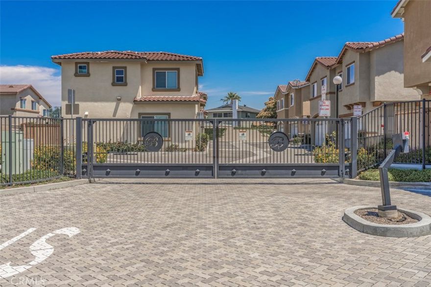 Beautiful Townhome in a desirable gated community of Belterra! Only 15 units in this quite community of West Anaheim! Home features 3 bedrooms, 2 1/2 bathrooms, spacious loft/office, primary bedroom with a walk-in closet. Open floor plan, kitchen with a large granite counter tops island with backsplash, stainless steel sink and appliances, laminated wood floors downstairs and upstairs, recess lighting, designer selected paint color throughout the home, window covering, Central Heat & A/C. Enjoy the cozy backyard for entertaining and BBQ, 2 car attached garage and an assigned guest parking. Close to award winning schools, easy access to attractions and minutes away from shopping and dining, close FWY access.
