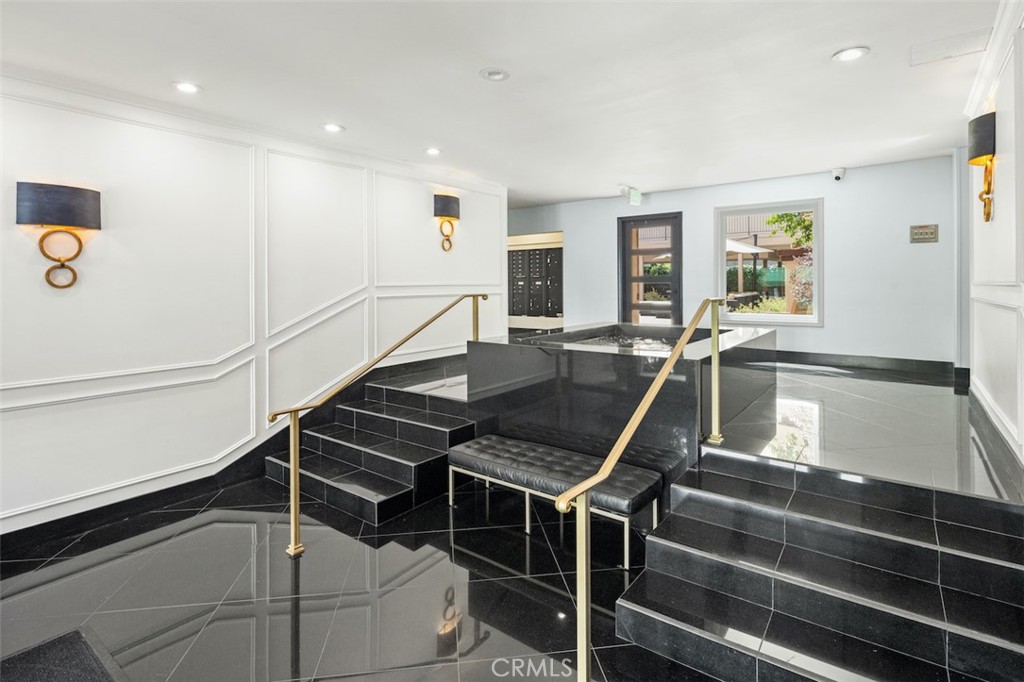 Located in the heart of West Hollywood, this chic 2-bedroom, 2-bath condo offers a unique blend of artistic design and modern updates. Current features include remodeled bathrooms, black maple hardwood floors with mirrored moldings, custom blackout curtains in the primary suite, a guest bedroom with custom moldings, Venetian plaster accents, recessed lighting, and designer wool carpet. To further enhance the home, the landlord is planning upgrades including new hardwood floors, refreshed kitchen countertops, a new vanity in the primary bath, and updates to the guest bath. Residents will enjoy spacious interiors, abundant natural light, community amenities such as a sparkling pool and inviting common areas, and a prime location just steps from world-class dining, shopping, nightlife, and the vibrant Sunset Strip.