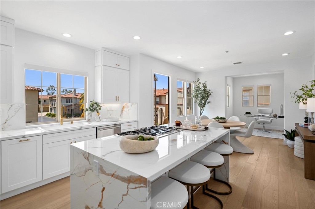 Rare Turnkey Luxury Residence in Newport Coast’s Exclusive Ziani Community!
Welcome to 16 San Pietro—a true turnkey gem in the heart of Newport Coast, masterfully remodeled with designer-level finishes throughout. This rare offering stands out for its generous 2,200+ square feet of living space, thoughtful floor plan, and unparalleled quality—making it the finest luxury condo available at this price point.
Perfectly situated within the coveted gated community of Ziani, this three-bedroom, two-bath residence blends coastal elegance with everyday comfort. From the moment you step inside, you’re welcomed by rich architectural details including accent stone walls, Calacatta Gold Borghini countertops in the kitchen and all bathrooms, and designer lighting and finishes that elevate the home’s sophisticated ambiance.
The open-concept living and dining areas each feature their own private balconies, allowing you to enjoy coastal breezes and natural light throughout the day. The chef’s kitchen is a showpiece—complete with a large island, premium appliances, and sleek cabinetry—perfect for entertaining or simply enjoying everyday meals in style.
The primary suite is a private retreat featuring a spa-inspired bathroom with a separate soaking tub, walk-in shower, accent walls, dual vanities, and a massive walk-in closet. A second bedroom also features its own walk-in closet, ideal for family or guests.
Ziani offers resort-style amenities including a private pool and spa, barbecue and outdoor fireplace areas, and multiple viewing terraces with sweeping vistas of the local mountains and ocean. The community is 24-hour gated, providing peace of mind and security.
Outdoor enthusiasts and families alike will appreciate the unbeatable location—just moments from the Newport Coast's Pacific Ridge trail system, Coastal Peak park and soccer fields, top-rated private and public schools, world-renowned beaches, and luxury shopping and dining at Fashion Island.
This is more than just a home—it’s a lifestyle. With no other three-bedroom property offering this size, level of upgrades, and community amenities in Newport Coast at this price point, 16 San Pietro is a rare opportunity that won’t last.
Live the coastal luxury lifestyle you’ve been waiting for.