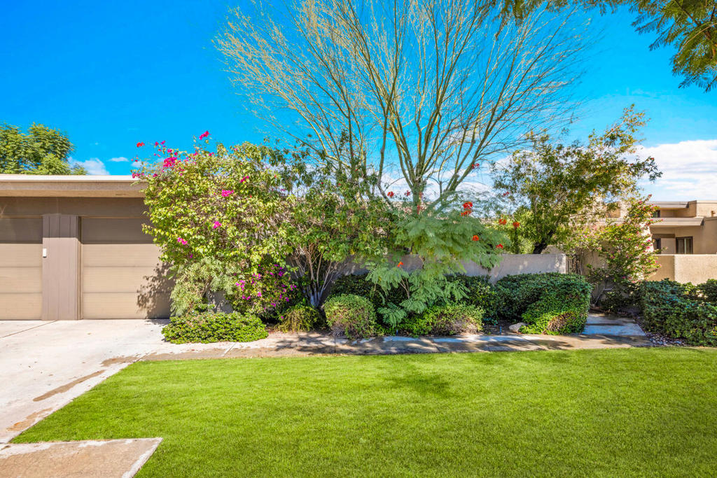 TRUST SALE! No court approvals needed. Centrally located in the heart of Palm Springs, The Rose Garden is defined by mid-century modern architecture in a resort-style setting. Designed by world renowned mid-century architect, Donald Wexler this low building density complex sits on 14 well manicured acres in the heart of Palm Springs. Amenities include 2 pools, 3 spas, tennis and pickle ball courts. The complex is pet friendly and close to downtown Palm Springs with restaurants, shopping and nightlife. Private entry courtyard leads into this 2BR/2BA unit with tons of natural light, an open plan and bedrooms on opposite sides of the living area offering great separation and privacy. Unit is mainly in original condition and is priced accordingly. Single attached garage. Land lease has been extended to 2077 and is approx $3,258 per year. HOA monthly fee of $640. includes building, grounds and pool/spa maintenance, cable tv, insurance & private nighttime security. Newer Lennox HVAC & Maytag water heater. Property is sold in ''As-Is'' condition. No repairs or credits.