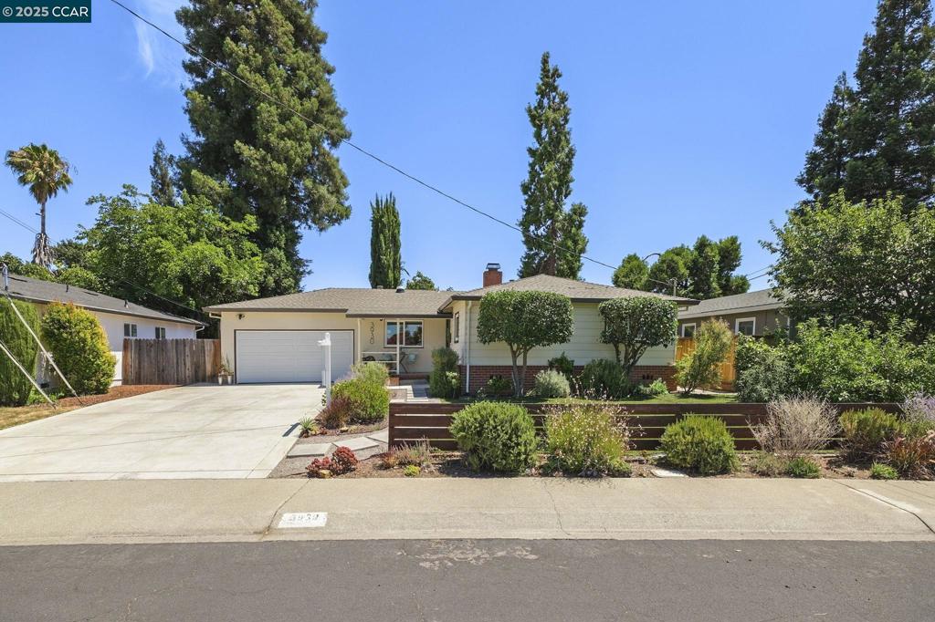 Welcome to this thoughtfully renovated single-story home nestled in the highly desirable, community-oriented neighborhood of Dana Estates. The modern, light-filled kitchen is a true showstopper—featuring elegant chandeliers, quartz countertops and backsplash, stainless steel appliances, an induction stovetop, and a reverse osmosis water system—perfect for both everyday living and entertaining. An open-concept floor plan creates a seamless flow, enhanced by solar tubes for abundant natural light, refinished hardwood floors, new interior paint, dual-pane windows, updated bathrooms, and brand-new shaker style doors. Step through the large sliding glass door to a covered patio overlooking beautifully landscaped backyard. A bonus shed with electricity and air conditioning offers possibility as an office pod. Additional highlights include a newly poured driveway, attached two-car garage, and drought-tolerant landscaping with artificial turf, an herb garden, and fruit-bearing apple trees. Located just 7 minutes from Concord BART and with the option to join the nearby Gehringer Pool & Garden, you’ll enjoy convenient commuting and a vibrant neighborhood with year-round community events. OPEN Fri 7/25 from 4 to 7. Sat & Sun 1:00 to 4:00.