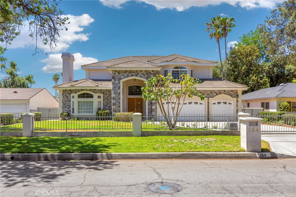 Seller offering 2-1 rate buydown to reduce buyer's interest rate! Step into timeless elegance with this stunning custom-built estate, nestled in a peaceful and highly desirable neighborhood of South Arcadia. Beyond the beautifully landscaped front yard and private electric gate, a grand 20-foot-high foyer welcomes you with a dazzling chandelier and an elegant staircase—setting the tone for the sophistication that flows throughout the home.
The thoughtfully designed floor plan offers both luxury and functionality. On the main level, you'll find a formal living room, a cozy family room with a built-in wet bar perfect for entertaining, a refined formal dining room, and a private office ideal for working from home. The main kitchen is bright and well-organized, seamlessly connected to a functional wok kitchen—designed to meet the needs of both daily cooking and special occasions.
A private guest suite with its own full bath is conveniently located on the first floor, along with a stylish powder room and a spacious laundry room. Every detail has been designed with comfort and practicality in mind.
Upstairs, you’ll discover four generously sized ensuite bedrooms, including a luxurious primary suite. Each room offers ample space, natural light, and privacy, making it ideal for multi-generational living. The home’s square, well-balanced layout enhances its sense of space and flow.
The backyard faces south, inviting warm sunlight throughout the day—ideal for outdoor entertaining or peaceful relaxation. The oversized three-car garage provides abundant storage and parking, while the secure front gate offers both privacy and peace of mind.
Located within the award-winning Arcadia Unified School District, and just minutes from top-tier dining, shopping, and amenities, this exceptional residence is ready for you to move in and enjoy the very best of Arcadia living.
