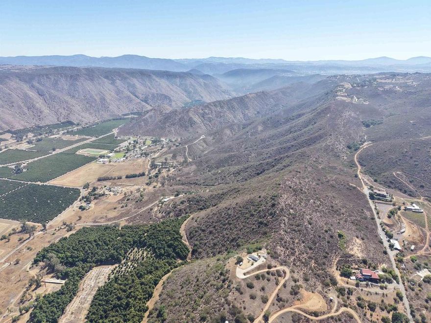 Discover 9.32 Acres of Scenic Potential in San Pasqual Valley -  Perched above the rolling hills of San Pasqual Valley on Bandy Canyon Rd, this stunning 9.32-acre lot offers panoramic views, unforgettable sunsets, and endless possibilities. Surrounded by local wineries, the San Diego Zoo Safari Park, and the historic San Pasqual Battlefield, this prime location is ideal for building a custom estate, private vineyard, or weekend retreat. Enjoy the perfect balance of peaceful rural living with city amenities just minutes away. A rare opportunity to own land in one of Escondido’s most picturesque settings.