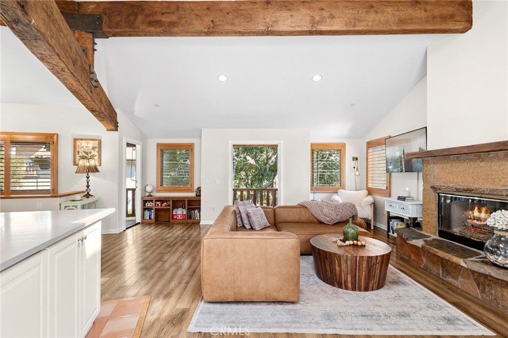 Welcome to Hidden Valley Canyon, a private, gated enclave tucked away in the natural beauty of Laguna Beach. This move-in ready home is a hidden gem offering a rare opportunity to own in one of the most sought-after coastal communities—at an incredibly affordable price.
Step into a warm and inviting space that blends modern comfort with a distinctive architectural charm. Surrounded by lush hills and natural rock formations, this home delivers an enchanting living experience immersed in nature.
With three bedrooms and two bathrooms, the layout is designed for both comfort and flexibility. Two generously sized bedrooms and a full bath are located on the lower level, along with an oversized laundry room/office. Upstairs, the private primary suite features a skylight, walk-in closet, and an adjoining bathroom with dual sinks and a shower-tub combo. The upper level offers an open floor plan including the kitchen and a light-filled living room with high beamed ceilings, offering privacy and serenity.
Step outside to enjoy multiple outdoor spaces that truly elevate the experience—front balconies with tree lined neighborhood views and a serene back deck nestled against a stunning natural rock formation. It’s the perfect setting for relaxing, entertaining, or soaking in the peaceful surroundings.
Located at the end of a quiet cul-de-sac on a private street, this home offers the best of both worlds: secluded living with convenient access to everything Laguna Beach has to offer. Just minutes from the beach, the vibrant village, and top-rated schools including Laguna Beach High School and Thurston Middle School, this home is ideal for first-time buyers, second-home seekers, or anyone dreaming of the Laguna Beach lifestyle.
Don’t miss this exceptional opportunity to own a move-in ready home in a premier Laguna Beach location.