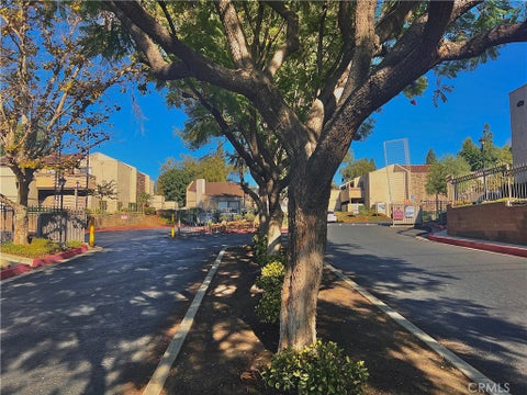 Photo of 3032 Associated Road #79, Fullerton, CA 92835 (MLS # RS26195543)