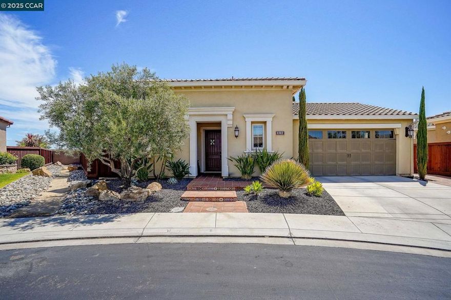 55+ Resort Living in Trilogy.  5 Priority Things About This Property Has.  It Is Tucked at the Back of the Cul de Sac, It Has No Back Neighbors with a View of The Wide-Open Sky, It has a Beautiful Large Yard with a Gorgeous Built-In BBQ w/Granite Counter, Perfect for Entertaining, & Lg. Water Fountain  It has Highly Upgraded Cabinetry, the Dining Cabinets Look Just Like Furniture, It has the High Ceilings from the Carl Lagoni Collection.  Extensive Wood Floors, Spacious Gourmet Kitchen, Formal Dining Room w/Wall to Wall Seating at Gas Fireplace, Light & Bright Great Rm., Lovely Primary Bedrm & Bath. 20 Year Builder Pre-Paid Solar Lease, Balance of Term to Be Transferred to Buyer.  Magnificent Clubhouse, Cafe, Indoor & Outdoor Pools, Spa & Exercise Facility, Activities and so Much More.