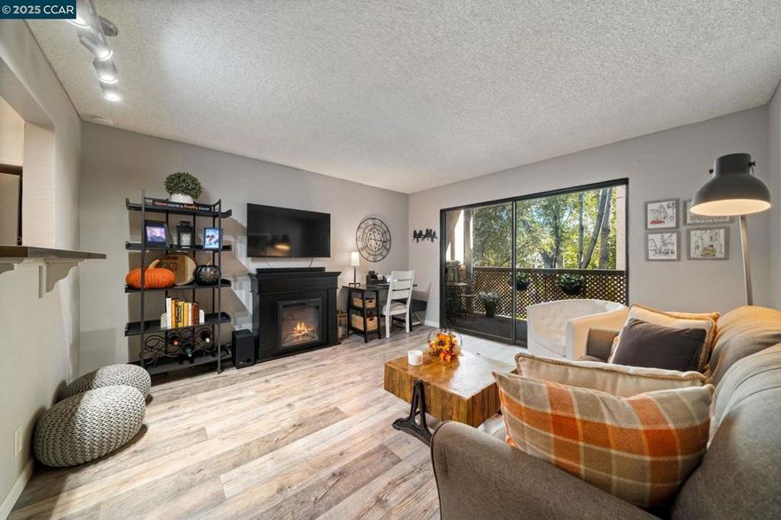 Affordable Updated Condo Living in the Heart of Walnut Creek!  Discover this move-in ready one bedroom home nestled in a quiet corner with a nice view of the trees within in the sought-after The Keys community—ideal for first-time buyers, down-sizers, and investors looking for a rental opportunity!  Freshly updated with new flooring, modern kitchen & bathroom finishes, paint, this cozy wooded feeling condo offers a spacious living room plus a peaceful balcony retreat. Extra perks include a personal designated hall storage closet, and an assigned garage parking.  Enjoy many amenities including three pools (one large resort style main pool heated year-round along with two smaller more private pools), gym and fitness center, sauna, tennis courts, clubhouse with pool tables and ping pong, and much more!   Perfectly located near downtown Walnut Creek with easy access to BART, shopping, dining, freeway connections, the Iron Horse Trail, and top-rated Walnut Creek and Acalanes schools.
