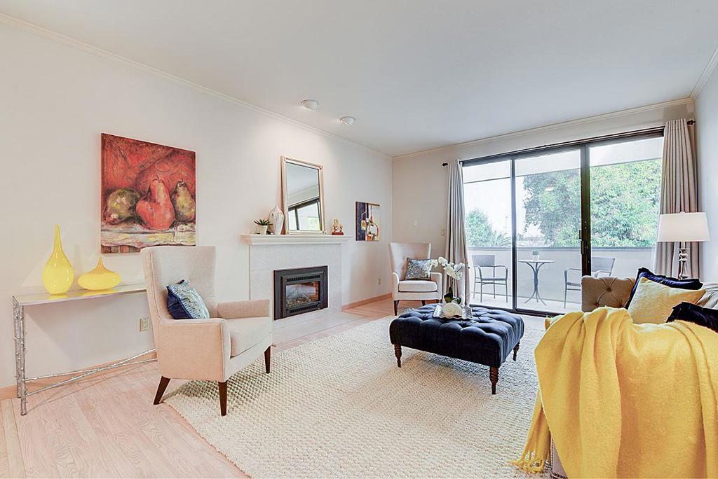 Just minutes from the Avenue, the train, and the Farmers Market. Top floor unit, located at the back of the building with skylights and tree-top views. Two bedrooms, two full bathrooms, and in-unit laundry. Plantation shutters and hardwood floors throughout. Welcoming entrance hallway leads to the roomy living room with gas fireplace, dining area and large east-facing deck beyond. Updated kitchen with gas range, Greenhouse window, breakfast counter, and pantry for additional storage. Master Suite features two closets, built-in vanity with skylight, separate shower and commode. Second full bath with shower over tub and skylight. Second bedroom / office offers privacy and a quiet retreat. This is a small complex, only 15 units. Off street 2 car parking and storage in the gated garage. Imagine playing, entertaining and living in Burlingame within a stone's throw of shopping, dining and small-town festivities!