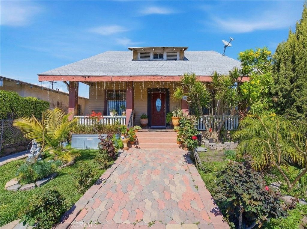 Photo of 123 E 65th Street, Los Angeles, CA 90003 (MLS # PW26047446)