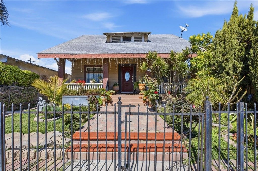 Photo of 123 E 65th Street, Los Angeles, CA 90003 (MLS # PW26047446)