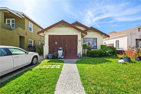 Photo of 2173 Olive Ave, Long Beach, CA 90806 (MLS # MB26067438)