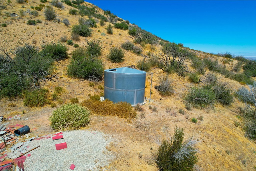 5.37 Acres with Breathtaking Views and Water Access – Build Your Dream Escape!
Don't miss this incredible opportunity to own 5.37 acres of scenic land in the highly sought-after Juniper Hills area of Littlerock. Located right off a paved road, this parcel offers easy access and stunning panoramic views of the surrounding mountains and natural landscape.
The property features a 2,200-gallon water tank and existing well, providing an essential head start for future development. A recorded survey with corner markers is already in place, saving time and money for prospective builders.
Whether you're looking to build your dream home, start a ranch, or invest in land with tremendous potential, this lot is ready for your vision. The area offers both tranquility and convenience, making it perfect for a weekend getaway or a permanent retreat.
Buyer to verify all aspects of development including utilities, well testing, zoning, and building requirements with Los Angeles County.