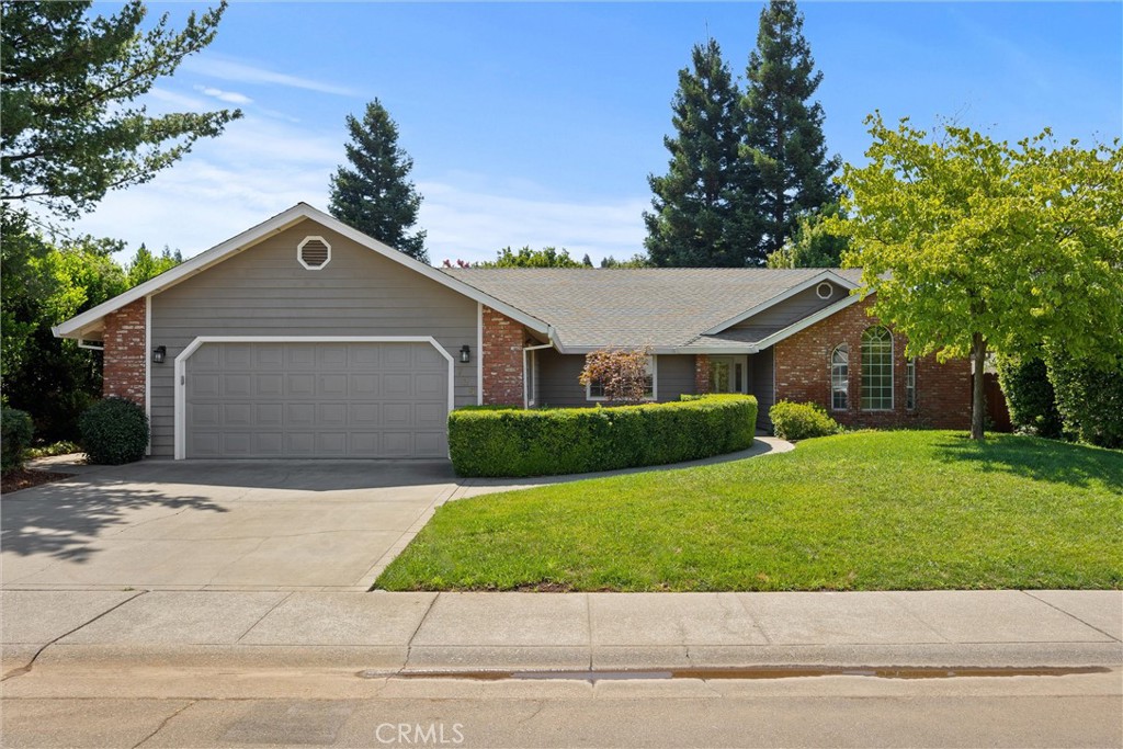 This charming, traditional home, featuring a brick facade and a curved sidewalk leading to the front entrance, is tucked away near the end of a cul-de-sac street.
Recently renovated, it features new flooring and painted cabinetry, presenting a pristine, turnkey condition ready for immediate occupancy.
The home features an impressive entry. Beautiful double French doors lead into
a formal living room featuring large windows, a vaulted ceiling, and a dedicated formal dining room. The open floor plan seamlessly connects the family room, with its vaulted ceiling and gas stove, to the spacious kitchen and eating area. The kitchen boasts granite countertops, an island, and a sink perfectly positioned at the window overlooking the backyard. Enjoy meals in the eating area in front of a lovely bay window. A French door from the family room leads to a serene covered patio.
The master suite has two closets and offers a private door to the backyard. Its ensuite bath is a private oasis with a large corner tub, step-in shower, dual sink vanity, linen storage, and a private water closet. A hall bath serves additional bedrooms with a dual sink vanity, a water closet, and a full bathtub/shower.
Convenience is key with a large laundry room providing cabinetry for extra storage and a sink. The shady backyard, with its mature trees and covered patio equipped with ceiling fans, offers a cool retreat on warm summer days. A corner shed offers ideal space for a garden project or simply additional storage. An oversized two-car garage provides ample space and includes a drop-down ladder to attic storage.