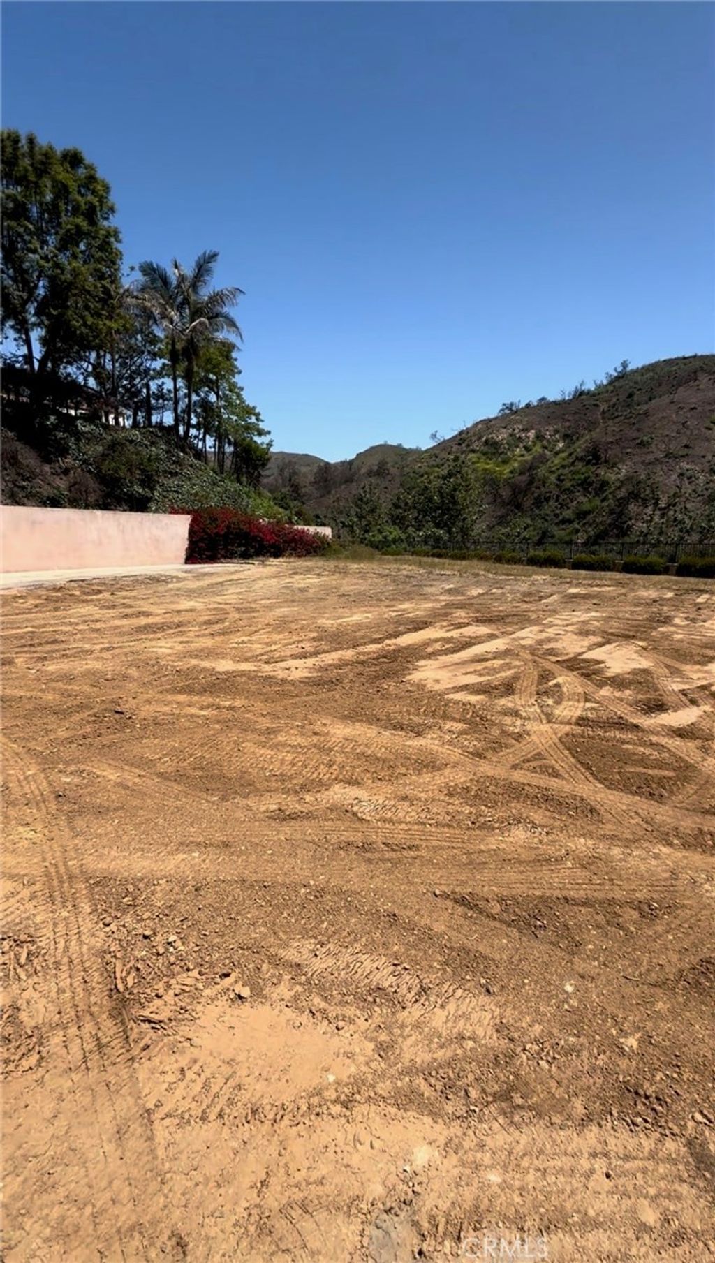 Photo of 1296 Marinette Rd, Pacific Palisades, CA 90272 (MLS # SB25219374)