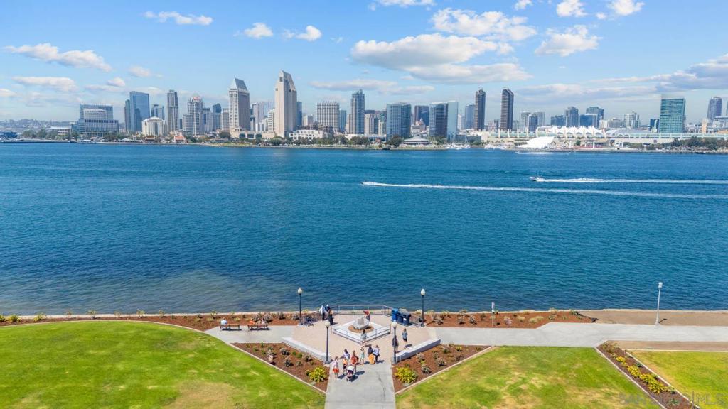 Welcome to The Landing! A premier condominium community nestled on the peaceful Coronado Island. This coveted waterfront location offers stunning views of the Bay and the downtown San Diego skyline. This beautifully renovated and meticulously maintained residence features upgrades throughout, including the kitchen, living room, bathrooms, and entryway. The primary bedroom offers generous space, complete with a walk-in closet and an expansive en-suite bathroom. The spacious kitchen is equipped with high-end Bosch and KitchenAid appliances, soft-closing cabinetry, and dimmable lighting for a refined and functional space. The unit also includes 2 side-by-side parking spaces — a valuable convenience. Residents of The Landing enjoy exclusive access to premium amenities, including a fitness center with sauna, a private pool and spa, and an event room available for private gatherings. With close proximity to the Coronado Ferry Landing and top dining on Orange Avenue, the lifestyle here is as vibrant as it is relaxed. Come experience it in person, and see what makes The Landing so special!