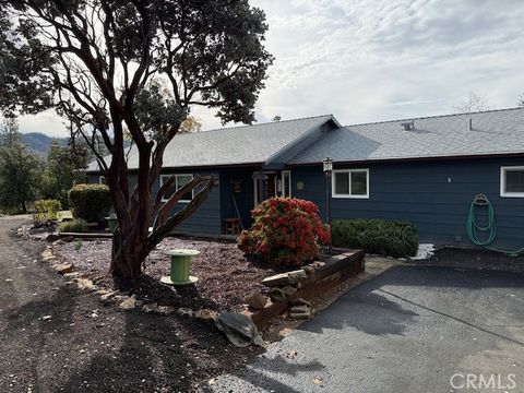Photo of 39468 Summit Drive, Oakhurst, CA 93644 (MLS # FR26054674)