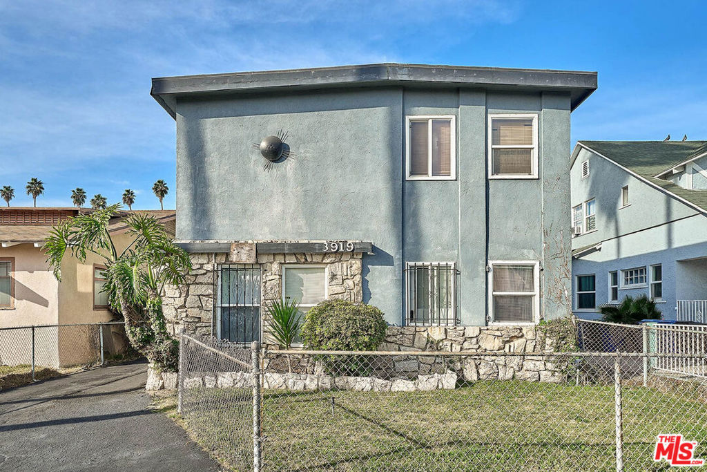 This is the good value Add Opportunity you have been waiting for ! Perched at a quiet three lined street , half of this great income property,s units are very good condition , one unit is vacant and brand new Hard floor,all kitchen cabinet , windows repaired will rent $2600 /m . All units are separately metered ,the property is consisted of 4 efficient and solid 2 bedroom 1 bath ,Current is very much lower than market value , close to USC campus and university village , One unit is section 8. New asphalt driveway and parking lot .