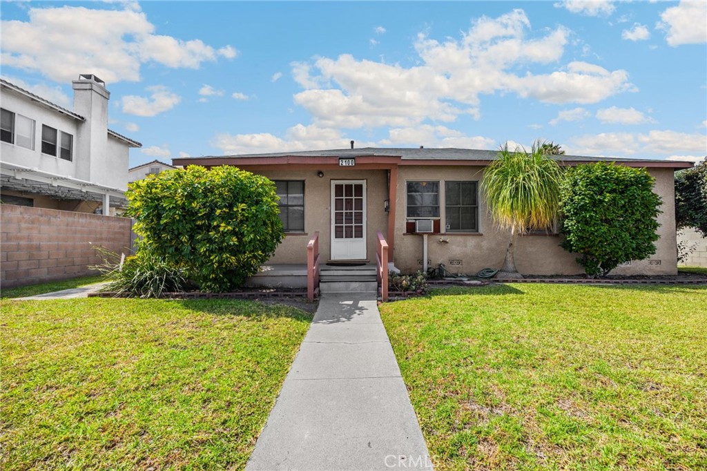Welcome to this charming Fullerton home nestled in a desirable neighborhood set back off the main street. From the moment you arrive, you are greeted by a white picket fence and an inviting front lawn. Step inside to discover a nice size living room that is light, bright and cheery. Each bedroom is spacious and has excellent closets with plenty of storage space. The main bathroom has a tile shower and tub. The home also offers inside laundry and a cozy breakfast nook for dining. The kitchen is quaint and has the most adorable antique range/oven. Outdoors is a 2 car detached garage with alley access which could be perfect for a potential ADU. The large backyard has several fruit trees and a covered patio allowing plenty of space for outdoor gatherings. Fullerton has a small town feel with a popular downtown area offering wonderful dining options, local shops, parks and excellent schools. Come see the endless possibilities and make this your dream home!