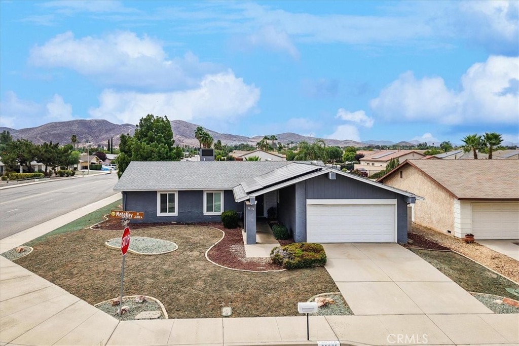 Beautiful single-story corner lot home in the desirable 55+ Sun City community of Menifee. Offering 3 bedrooms, 2 bathrooms, and approx. 1,697 sq. ft. of living space, this home provides comfort and convenience with plenty of room to enjoy. Though tax records show 2 bedrooms, the property features 3 full rooms. Recent updates include a newer AC unit, dual-pane energy-efficient windows, and wood laminate flooring. Enjoy extra privacy with no neighbors directly behind or beside the home. Fully paid solar panels add even more value and efficiency. Low annual HOA of $412 includes access to the Sun City Civic Center with two heated pools, fitness room, lawn bowling, horseshoe pits, and a variety of clubs and activities. Conveniently located near shopping, dining, and the 215 freeway.