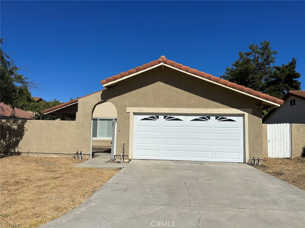 This beautiful single-family home is located in the Shadow Oaks neighborhood of Walnut, 3 bedrooms and 2 full bathrooms one-story home, with approximately 1,463 sqft of floor space, and 0.29 acres of lot size. Very quiet and private lot on a small cul de sac. A gated yard entry that offers a perfect space for patio furniture in a private setting at the entry! The distressed wood flooring leads you into the expansive living room where you can entertain your friends or family. Stainless steel appliances and granite countertop in the kitchen, where you can see out the windows and back door sliders. The backyard features a fireplace that has a tile facing, a wonderful place to enjoy a party time. Walking distances to Creekside Park, hiking trails, and schools such as Mt. Sac & Cal Poly Pomona. Easy access to the 10, 60 and 57 Fwy! This home is perfect for a family looking for a cozy home to move in!