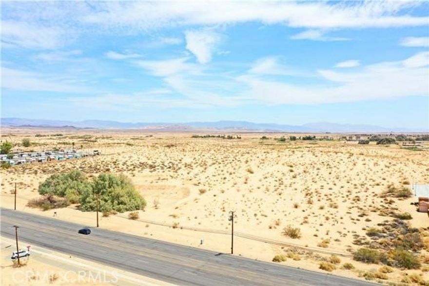 Perfect investment opportunity, located close to 29 Palms Military base, across from Smith's Ranch Drive In, next to Spirit & Truth Worship Center. With almost 5 acres of commercial land, the possibilities are unlimited.
