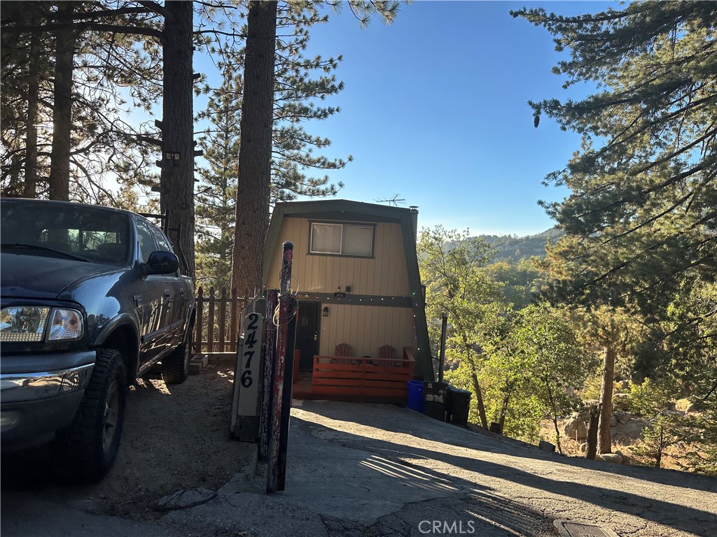Mountain Retreat with Breathtaking Views + Income Potential + EV Ready Plus Furnished + RV Parking ready and Generator set up ready!
This home is fully equipped with a generator hookup, providing peace of mind and reliable backup power during emergencies or outages.
Welcome to your dream mountain home, ideally nestled between Big Bear Lake and Lake Arrowhead — the perfect escape for year-round adventure or a high-demand Short-Term Rental opportunity!
This one-of-a-kind property offers stunning panoramic mountain views from two spacious balconies, creating the perfect setting for morning coffee or evening sunsets. The lower level features a private entrance, full bathroom, and flexible living space — ideal for extended family, guests, or even extra rental income.
Sitting on an expanded lot over 8,800 sq. ft. (combined from exclusive merged parcels), you’ll enjoy three flat-level parking areas plus, a rare find in this region! Plus, there’s an EV charging station (50amp) and ample room for RV or boat parking making a total of 4-5 parking spots— a game-changer for outdoor enthusiasts.
Inside, the home has been thoughtfully remodeled with attention to detail:
Newly updated kitchen & bathrooms
Brand new bathroom added to lower floor
Modern EV charging setup
Freshly built storage shed
And so much more!
Whether you’re looking for a serene retreat, a family-friendly escape, or an investment property in a prime location, this home delivers it all. Located in a vibrant community that celebrates peaceful charm and four full seasons, you’ll have access to:
Hiking & off-roading trails
Horseback riding & swimming
Fishing, boating, and seasonal activities at Lake Arrowbear
A welcoming mountain town spirit
Don’t miss out on this exclusive opportunity — homes like this are rare!