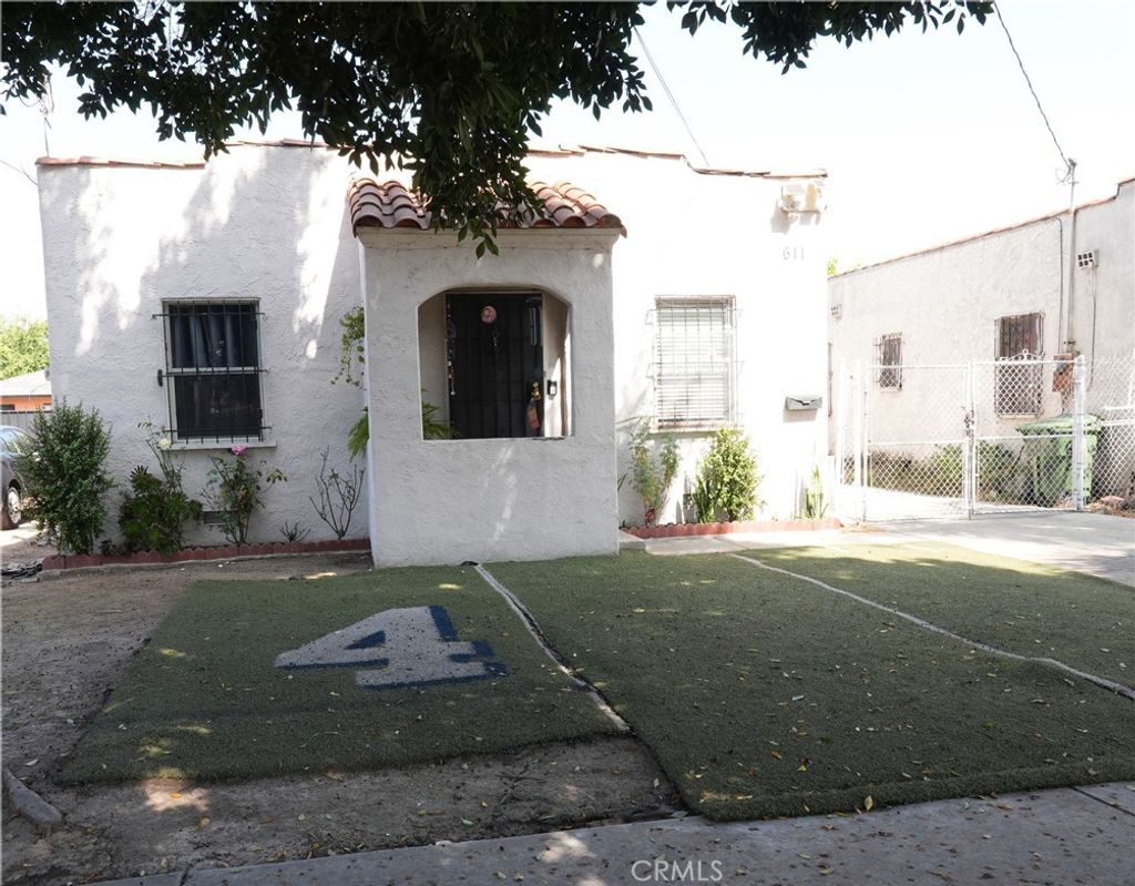 Photo of 611 W 91st St, Los Angeles, CA 90044 (MLS # PW26066484)