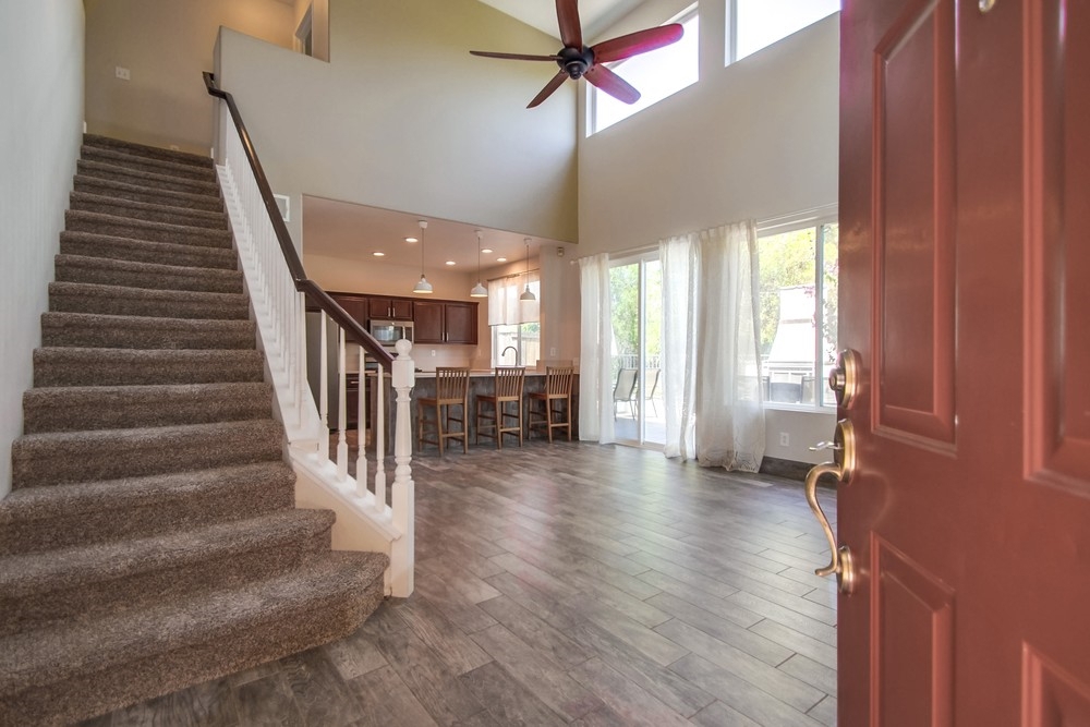 Beautifully upgraded home in the highly desirable Discovery Hills neighborhood. This home has lots of natural light and a wide open floor plan with high ceilings in the main living area. Home has a half bath downstairs along with office/additional room downstairs. Private patio with fireplace and bistro lights is perfect for entertaining. Beautiful master bathroom with pebble flooring and central A/C. Beautifully upgraded home in the highly desirable Discovery Hills neighborhood. This home has lots of natural light and a wide open floor plan with high ceilings in the main living area. Home has a half bath downstairs along with office/additional room downstairs. Private patio with fireplace and bistro lights is perfect for entertaining. Beautiful master bathroom with pebble flooring and central A/C. Neighborhoods: Discovery Hills