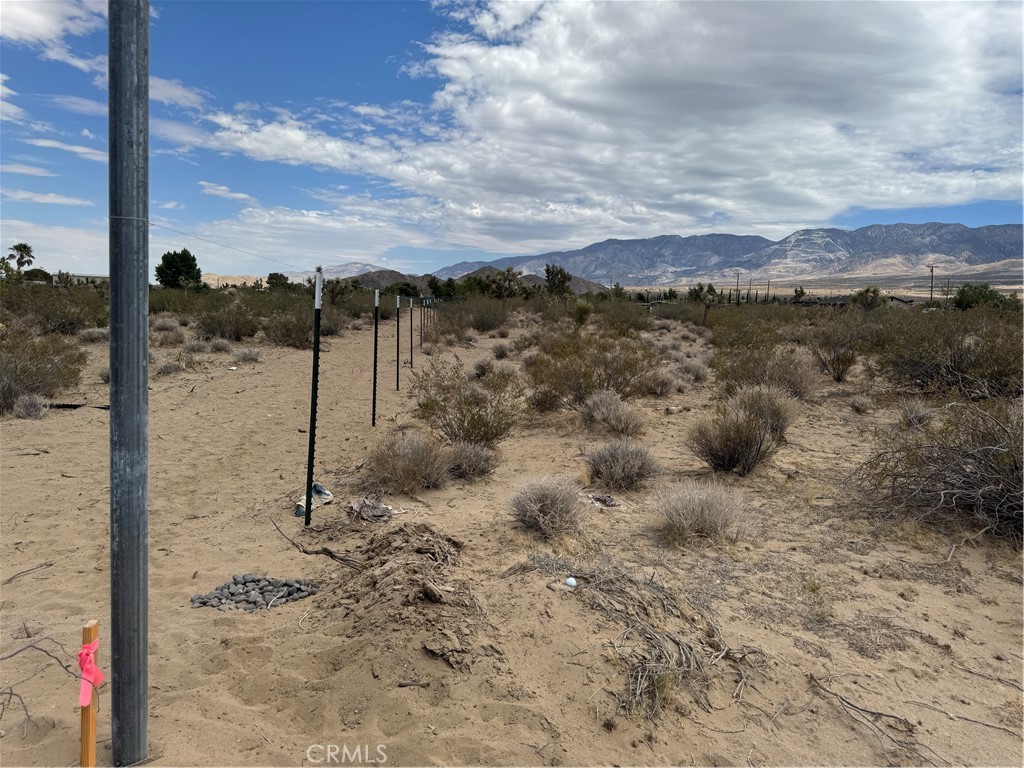 Do you have your manufacture home or planning to buy one and move it in to your own land? Even do you have your RV for vacations? Well this is an Excellent opportunity to buy this gem land in a good and quiet area of Lucerne Valley. The utilities are near by and just a half block away is the pavement road which is Custer Ave. This beautiful 2 acres, has a stunning mountain view, the downtown is around 4 minutes away, Big Bear city is around 35 minutes away. The property it is located in a corner in between Morningside St and Sharon Ave. Next to this beautiful land, is a house with all utilities and crossing the Sharon Ave it is another house, and then all around the area, are houses built with all services. The elecriticity posts are crossing this land, in the front and then at the back. This land has a lot of potential to build your own water well too and have your animals. Come and see this gem in the high desert and have a piece of land in San Bernardino County. The coordinates to come are 34.431707,- 116.987520. Just come on CA 18, make a right on Custer Ave (pavement road) and then right on Morningside st, and the lot it is in a corner, crossing the Sharon Ave. Have house with a low cost of buying a built property in this time!