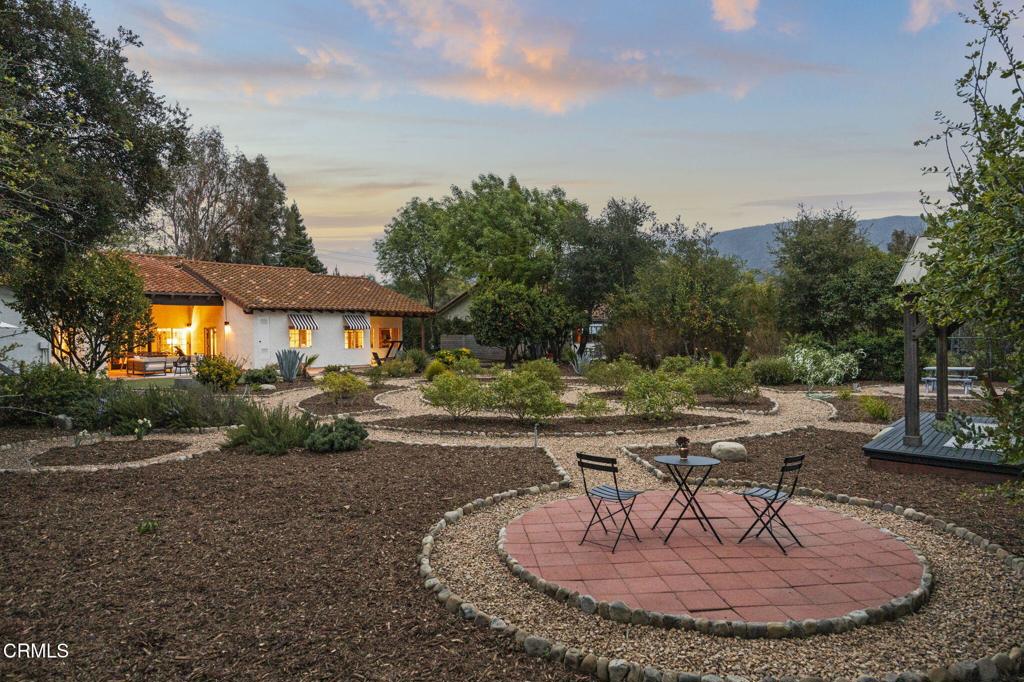 Welcome to 'Hole 19' - A Designer's Dream in Ojai. Nestled on a quiet lane, Hole 19 is a stunning designer residence that offers over 3,000 square feet of beautifully curated living space on more than half an acre, blending luxury, comfort, and an unbeatable location.With private gated access to Soule Park Golf Course--one of the nation's top-ranked municipal courses--enjoy direct entry to championship fairways and a clubhouse boasting some of the best views in Ojai. Inside, this home features three bedrooms, 2.5 baths, and a permitted Junior ADU that serves as a versatile space--perfect as a media room, family lounge, bar, or guest suite. The Farmhouse kitchen is a showstopper, featuring a center island with Wolf range, modern tile and custom walnut floating shelves--an entertainer's dream.The primary suite is a serene retreat, with an expansive sitting area and direct access to the classic courtyard of this California Spanish style home.Step outside into a meditative English garden with meandering paths, a charming fire pit, and an exquisite selection of fruit trees and lush landscape offering a truly peaceful oasis.For those with an eye for design, inquire about the option to purchase high design pieces & furnishings from designers like Kelly Wearstler & Nate Turner wallpaper, B&B Italia, Nancy Corzine, and George Smith.Located within walking distance to Ojai's vibrant downtown, you'll be just moments from art galleries, boutiques, renowned restaurants, and the beloved farmers market.Don't miss this rare opportunity to own a published Architectural Digest designer home--a true sanctuary of style and sophistication in the heart of Ojai.