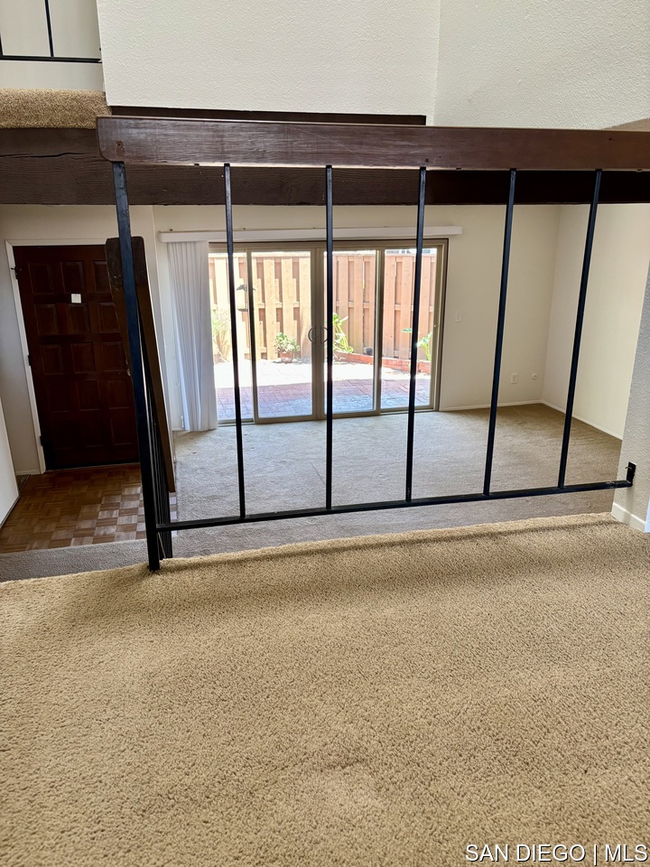 Has patio and balcony. Two car attached garage with opener, fireplace in living room. New central A/C