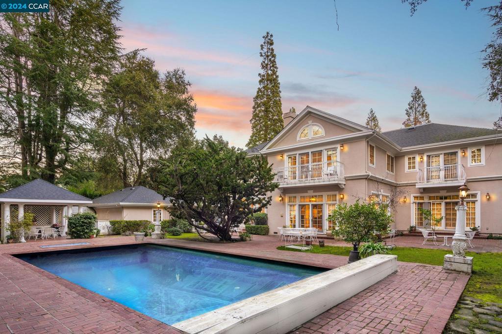 Open House 4/14 1pm-4pm Welcome to your serene retreat in the heart of Atherton's Lindenwood neighborhood, where elegance meets privacy in a lush, gated estate. Imagine stepping into a grand foyer leading to a majestic staircase and expansive living areas designed with entertainment and tranquility in mind. This traditional home features 6 generous junior suites, 1 beautiful office, 7 bathrooms, and a sprawling living area of 6,990 sqft, resting on a 0.92-acre lot adorned with multiple balconies, a tranquil pool and spa, and surrounded by nature's beauty. Enjoy top-rated Menlo Park schools, proximity to downtown Menlo Park and Palo Alto, and the luxury of hardwood floors, central cooling, and a three-car garage, all ensuring your comfort. This estate uniquely blends architectural elegance and natural charm, offering an unparalleled living experience.