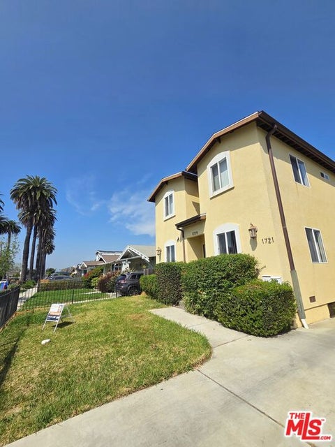 Photo of 1721 W 39th Pl PL, Los Angeles, CA 90062 (MLS # 26842101)